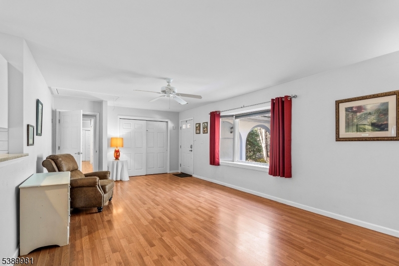 379 East Bird Village Road Jackson, NJ 08527 - Photo 27 of 38 a workspace with wooden floor and furniture