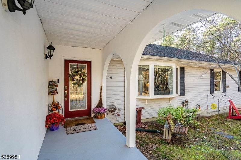 379 East Bird Village Road Jackson, NJ 08527 - Photo 5 of 38 a front view of a house with outdoor seating