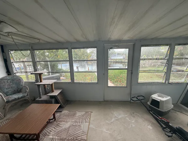 a room with furniture and a window