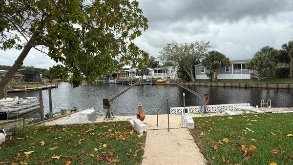 a house view with a lake view