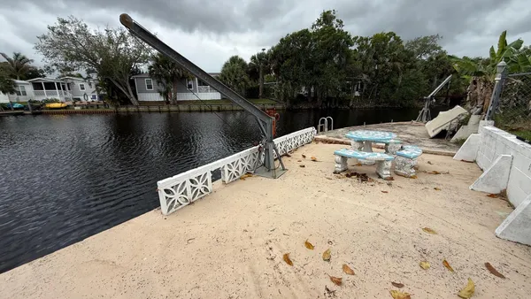 a view of roof deck with chairs