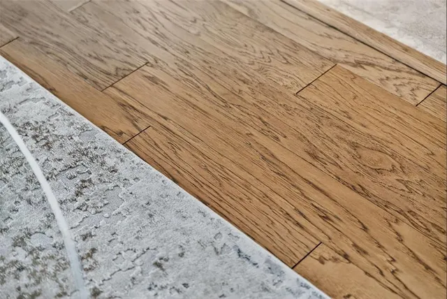 a large kitchen with a table and chairs