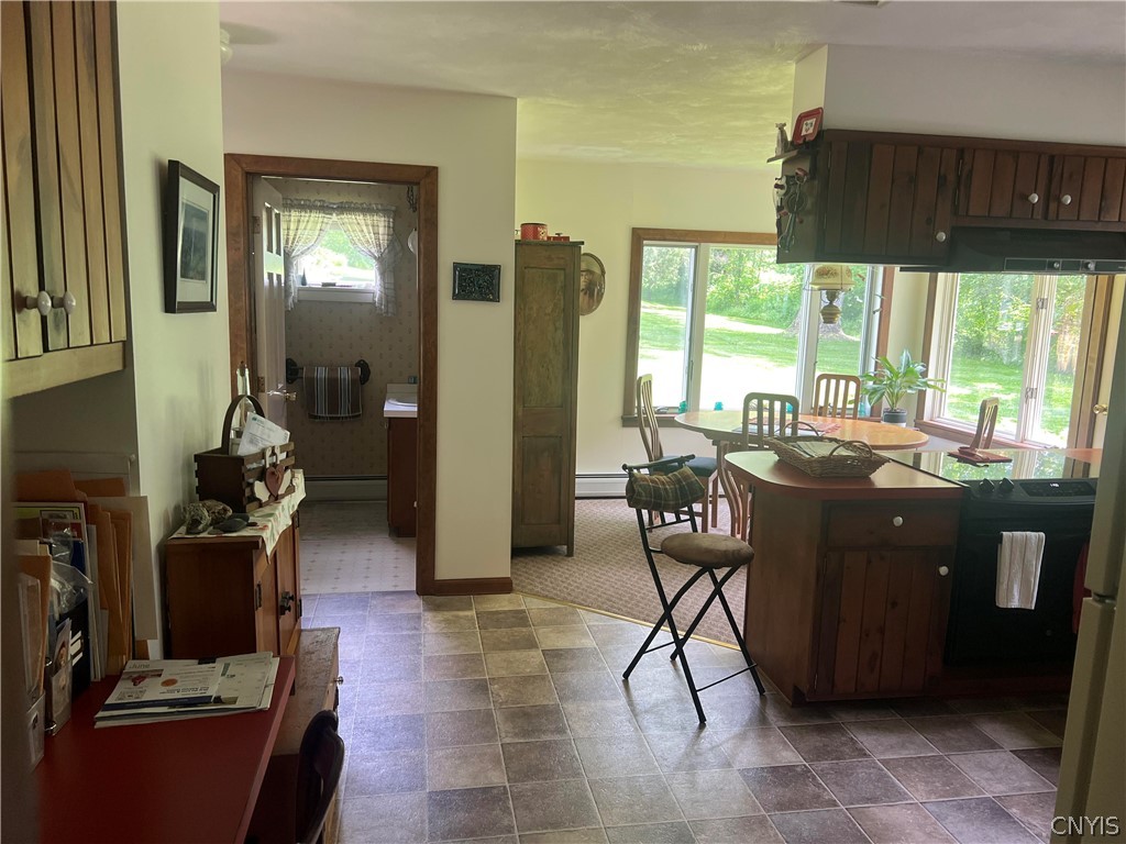 2778 Otisco Valley Road Marcellus, NY 13110 - Photo 11 of 44 very large country kitchen. Watch the birds and wi