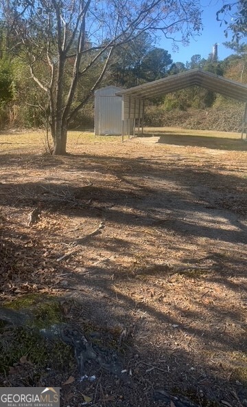 1650 Ware McLendon Road Tignall, GA 30668 - Photo 12 of 13 detached carport