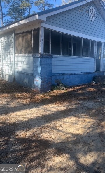 1650 Ware McLendon Road Washington, GA 30673 - Photo 5 of 6 a view of a house with a yard