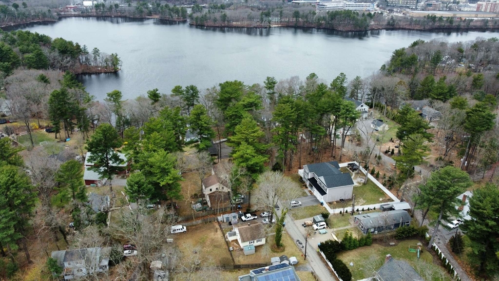 32 Birch Road Natick, MA 01760 - Photo 16 of 38 an aerial view of a house with a lake and outdoor space