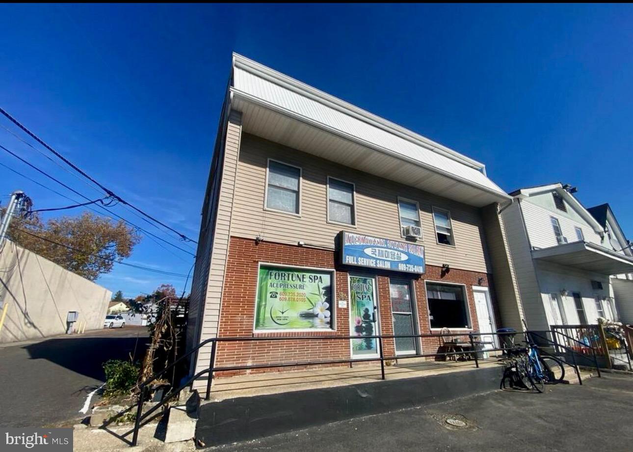 a view of a building with a street