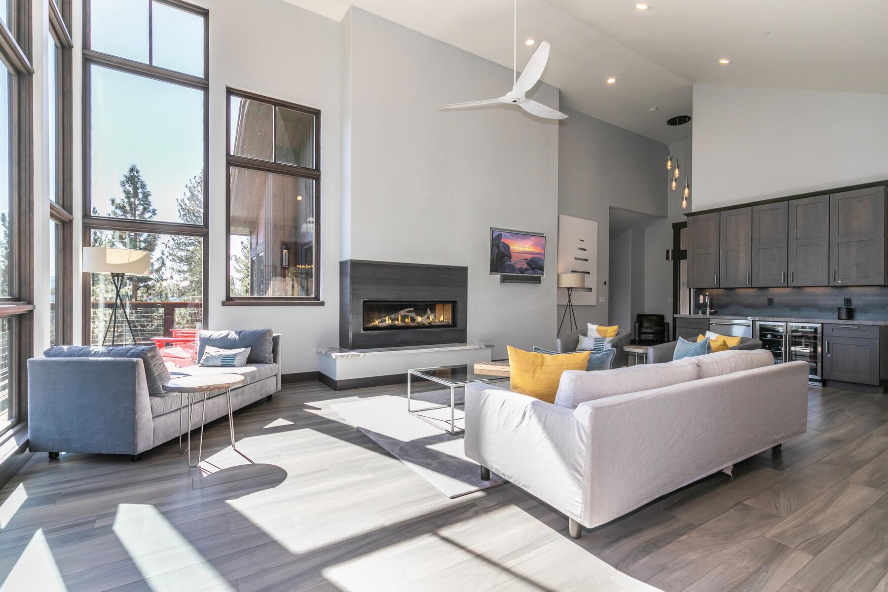 11863 Coburn Drive Truckee, CA 96161 - Photo 11 of 21 a living room with furniture a flat screen tv and a fireplace