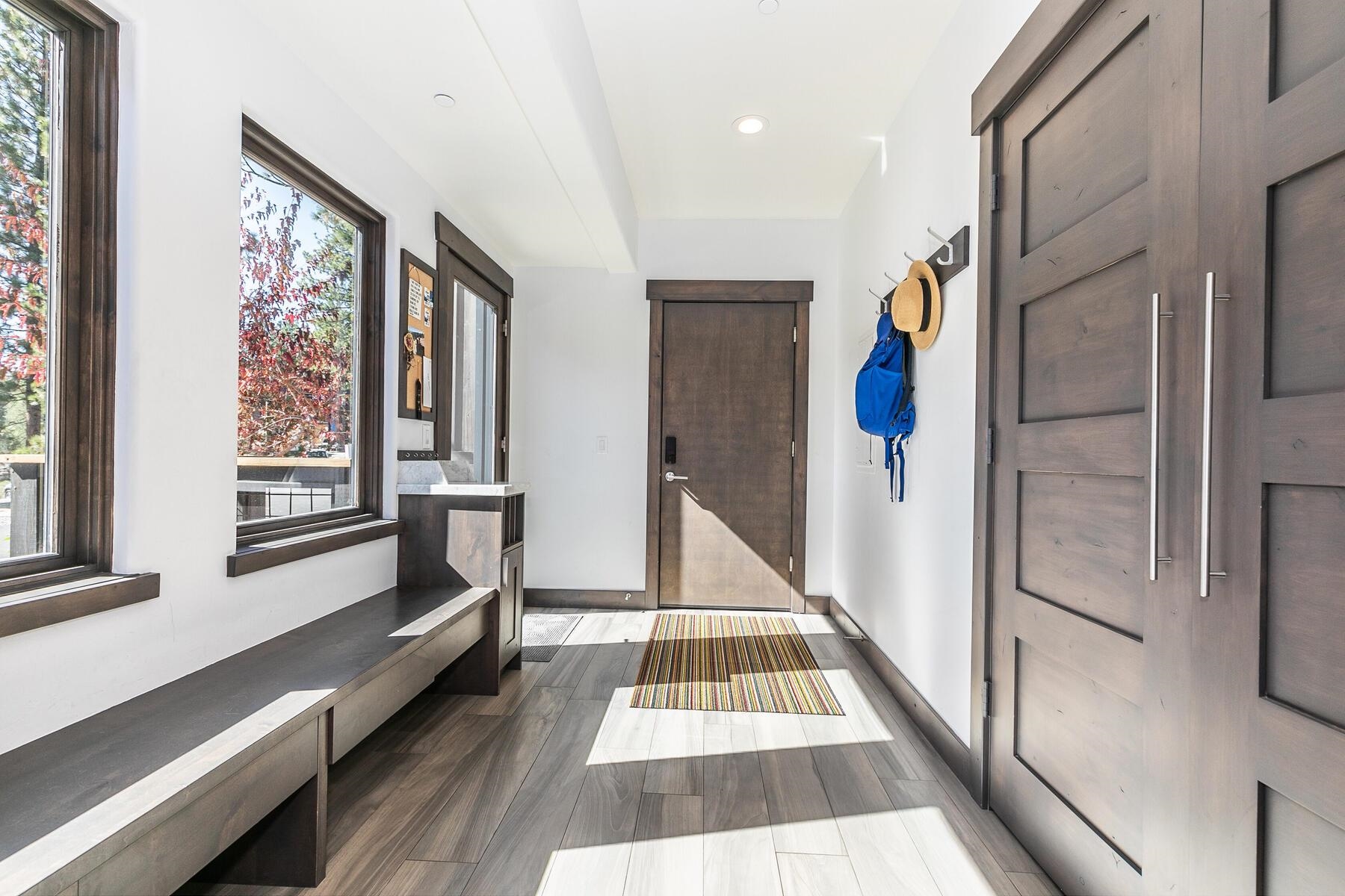 11863 Coburn Drive Truckee, CA 96161 - Photo 19 of 21 a view of a hallway with windows and stairs