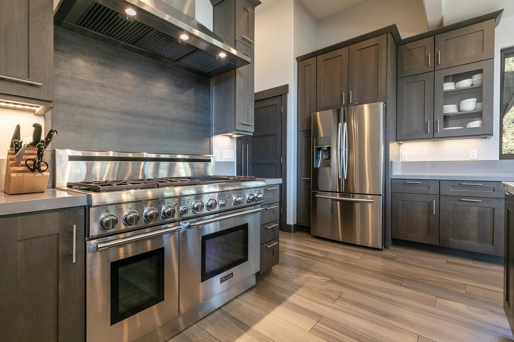 11863 Coburn Drive Truckee, CA 96161 - Photo 8 of 21 a kitchen with a stove top oven and refrigerator