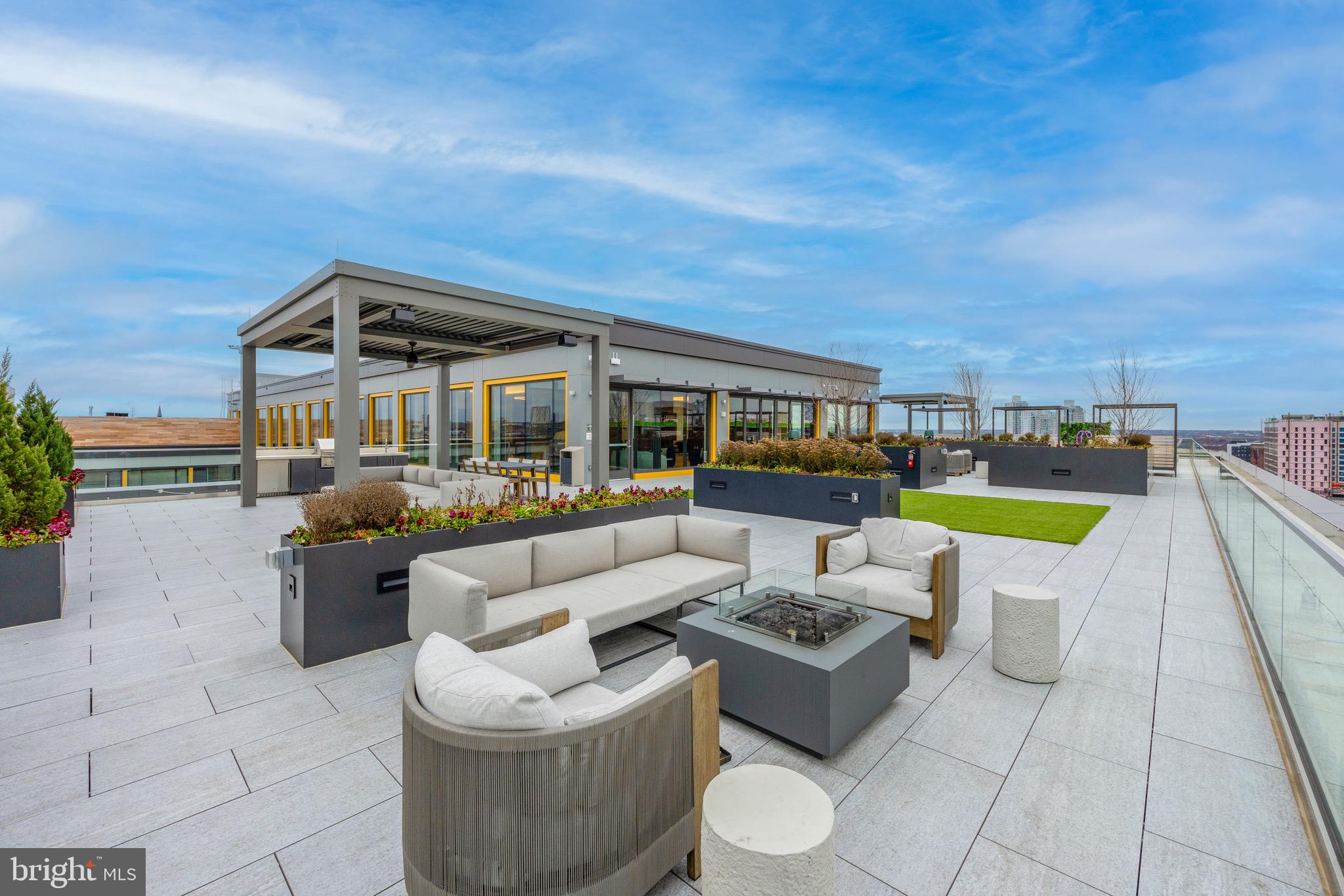 569 North 5th Street, Unit 902 Philadelphia, PA 19123 - Photo 30 of 49 a view of a patio with couches chairs and a potted plant