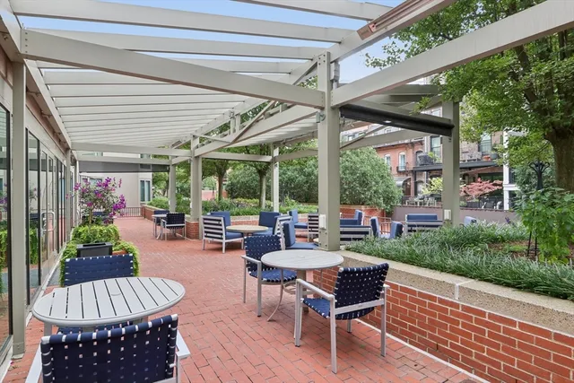 a outdoor living space with furniture and a garden