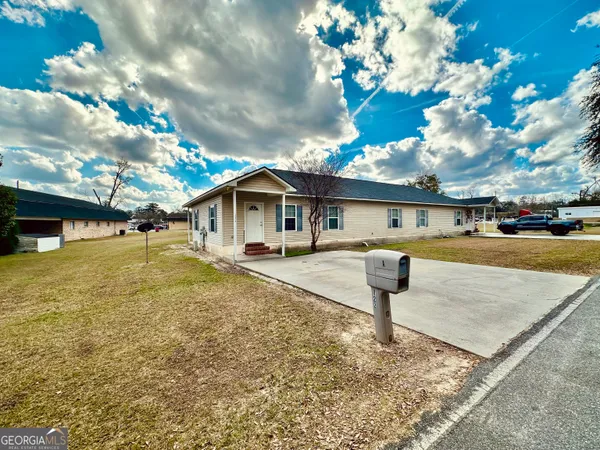 a view of a house with entertaining space