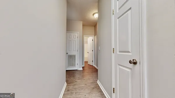 a view of a bathroom from the hallway