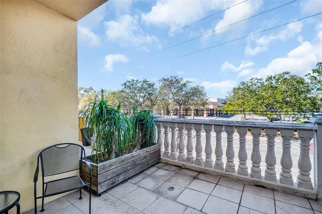 a view of a two chairs in the roof deck
