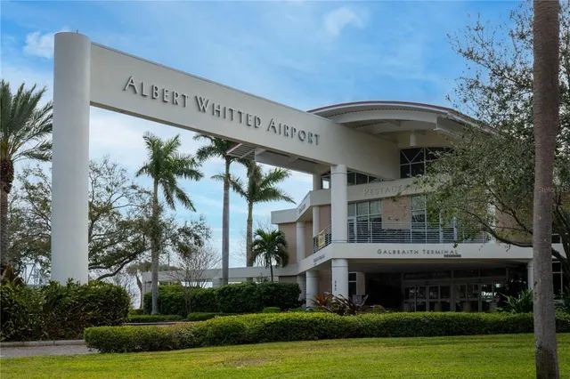 a front view of a building with garden