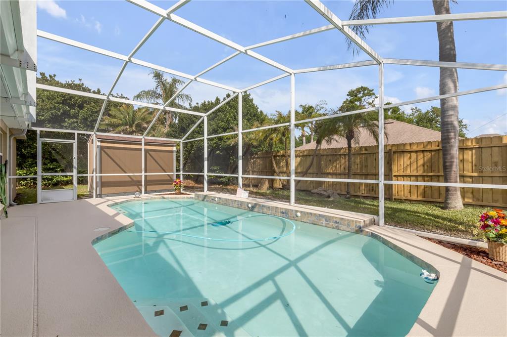 12232 Bronson Way Orlando, FL 32824 - Photo 22 of 32 a view of a room with gym equipment