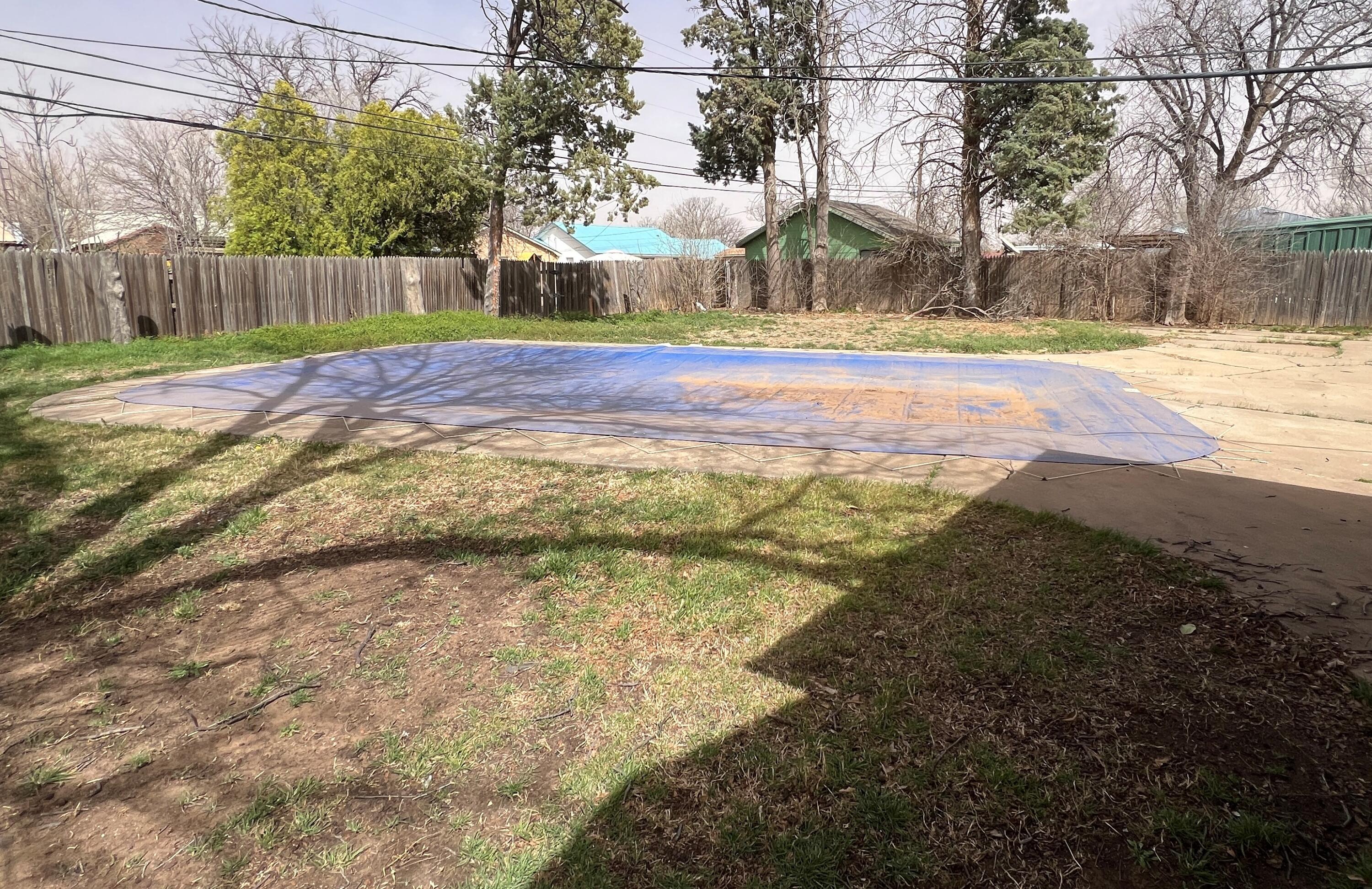 203 Northeast Alpine Plainview, TX 79072 - Photo 15 of 15 a view of a yard with basketball court