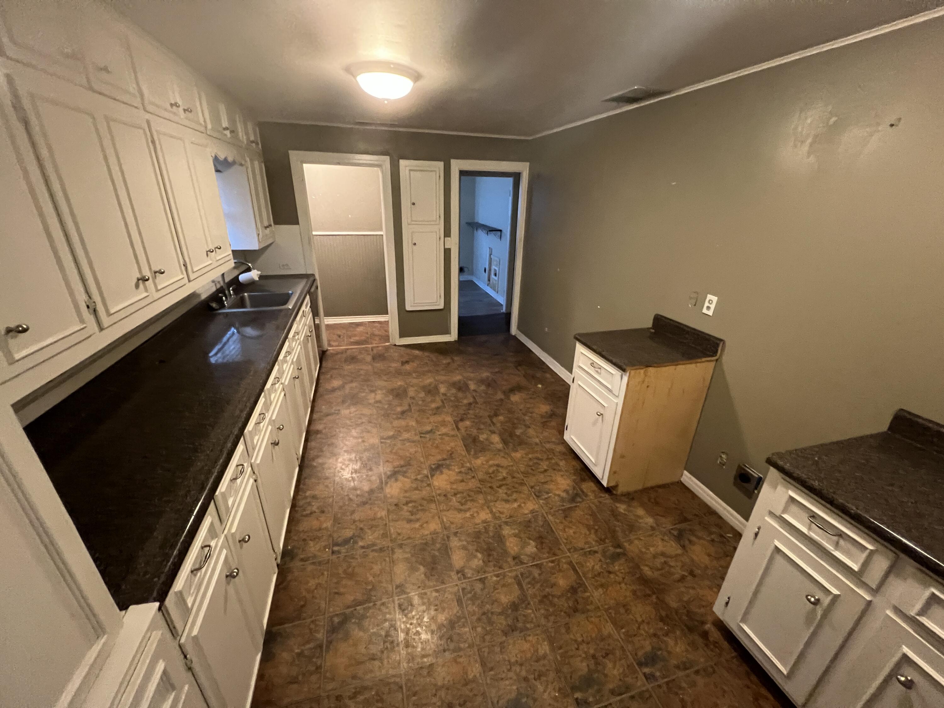 203 Northeast Alpine Plainview, TX 79072 - Photo 5 of 15 a living room with a couch