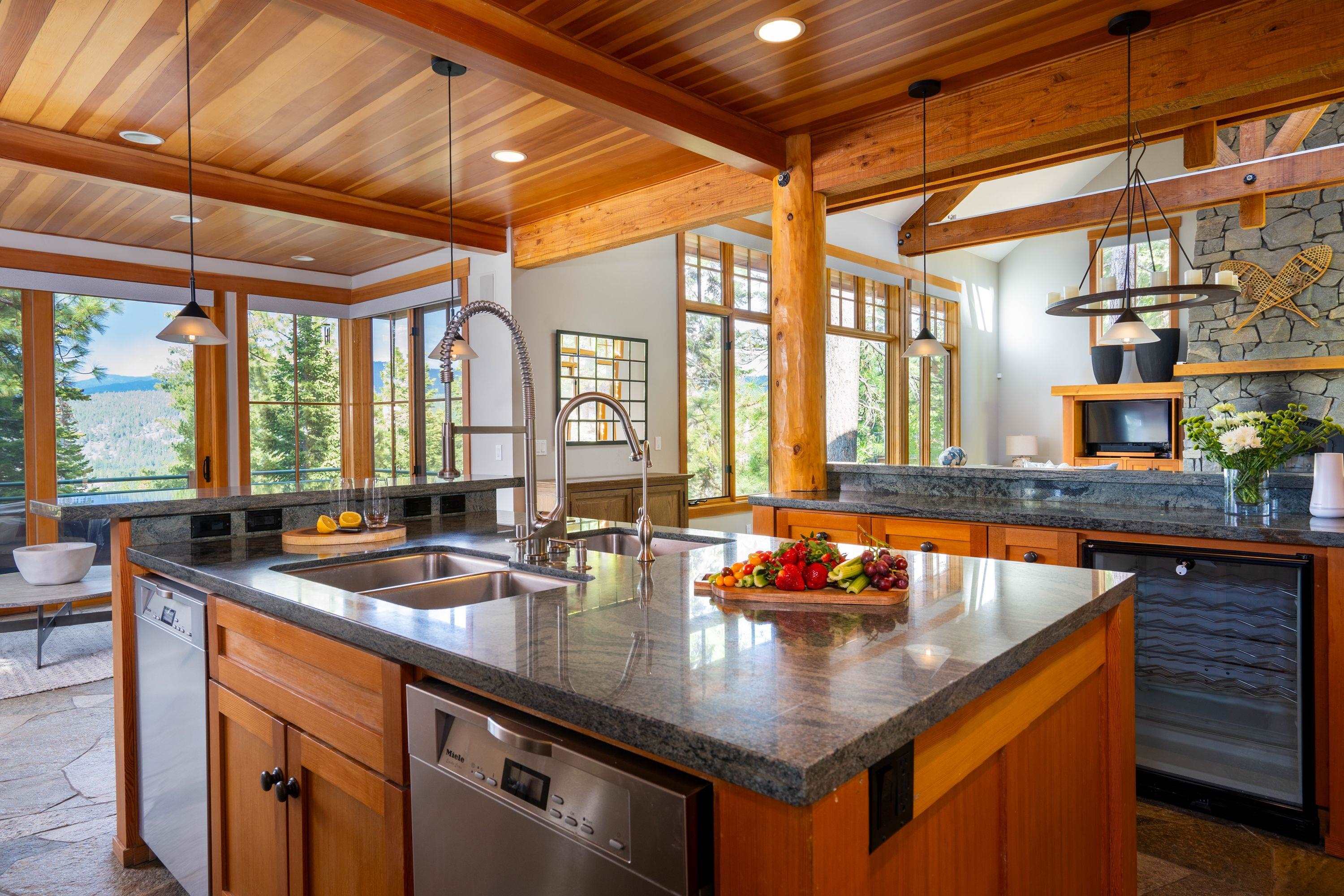 1723 Grouse Ridge Road Truckee, CA 96161 - Photo 3 of 27 a room with stainless steel appliances granite countertop a sink and a counter space