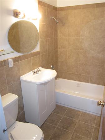 93 Rossmore Road, Unit 3 Boston, MA 02130 - Photo 5 of 11 a bathroom with a sink a toilet and bathtub