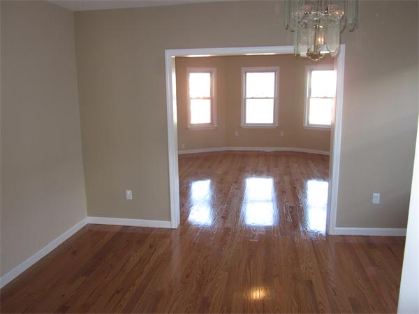 93 Rossmore Road, Unit 3 Boston, MA 02130 - Photo 7 of 11 a view of hallway with wooden floor