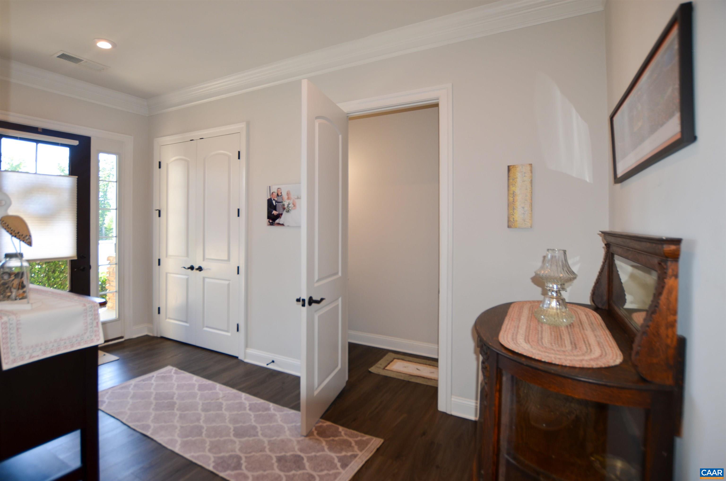 327 Claibourne Road Crozet, VA 22932 - Photo 7 of 36 a bathroom with a sink a light fixture and a mirror