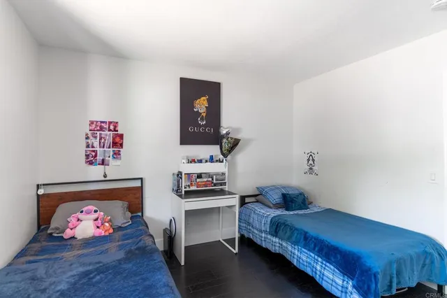 a bedroom with furniture and a bed