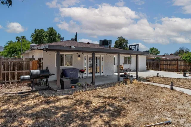 a view of a house with patio