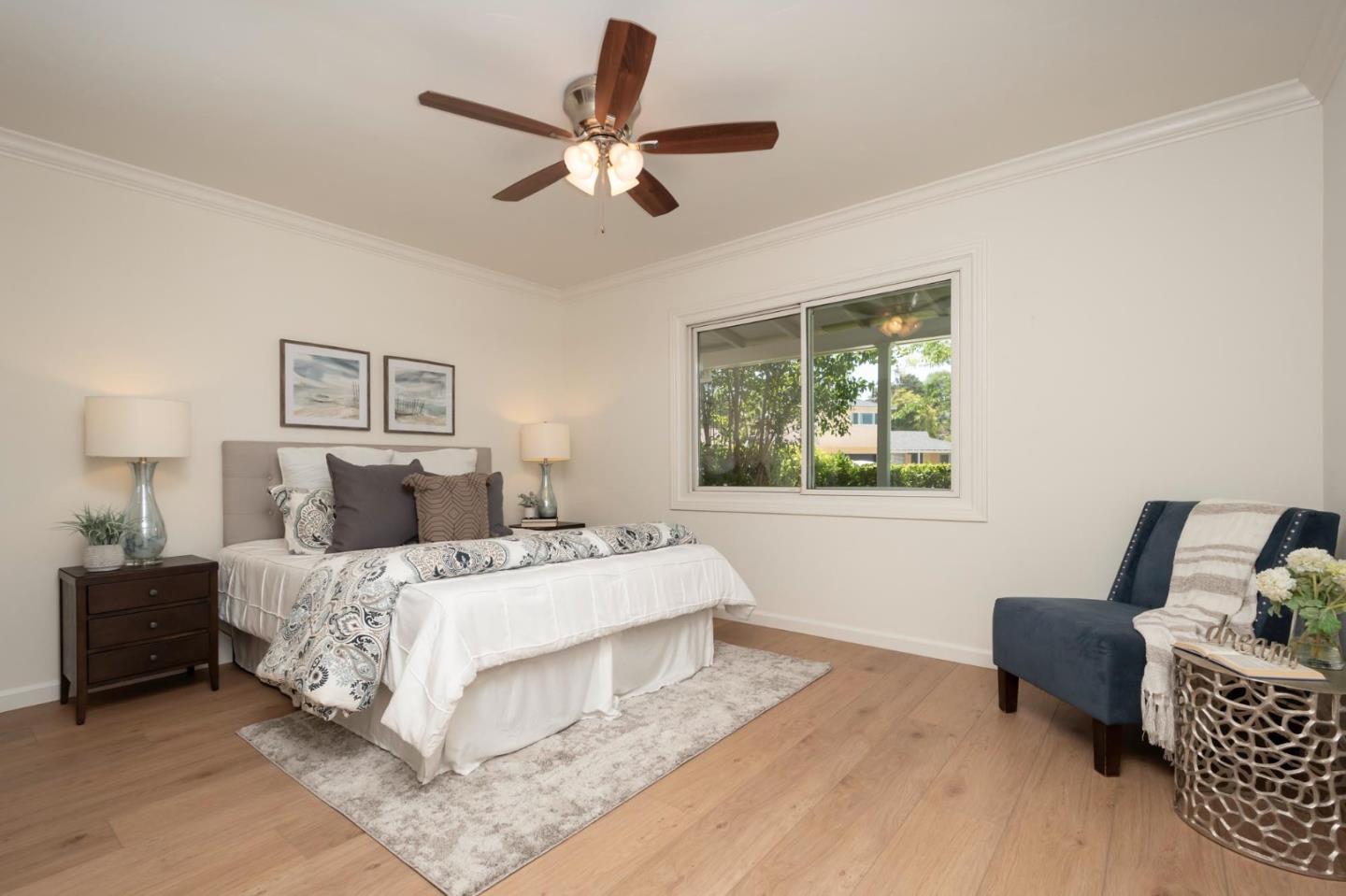 3989 Oneill Drive San Mateo, CA 94403 - Photo 20 of 47 a bedroom with a large bed and a window