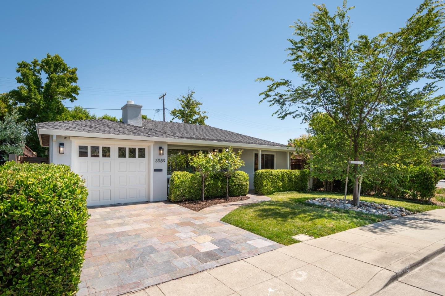 3989 Oneill Drive San Mateo, CA 94403 - Photo 2 of 47 a view of a house with a yard