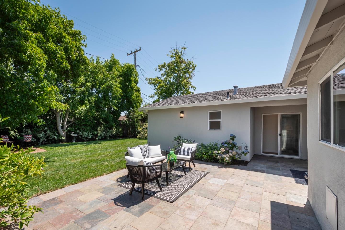3989 Oneill Drive San Mateo, CA 94403 - Photo 23 of 47 a view of a backyard with sitting area