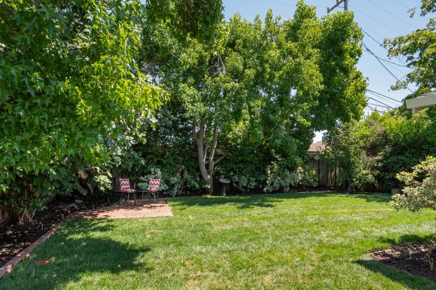 3989 Oneill Drive San Mateo, CA 94403 - Photo 25 of 47 a view of outdoor space with deck and yard