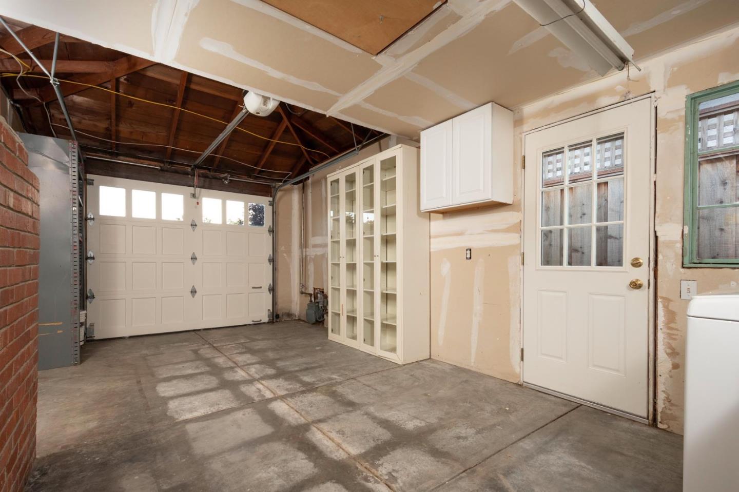 3989 Oneill Drive San Mateo, CA 94403 - Photo 28 of 47 a view of a room with wooden walls and windows