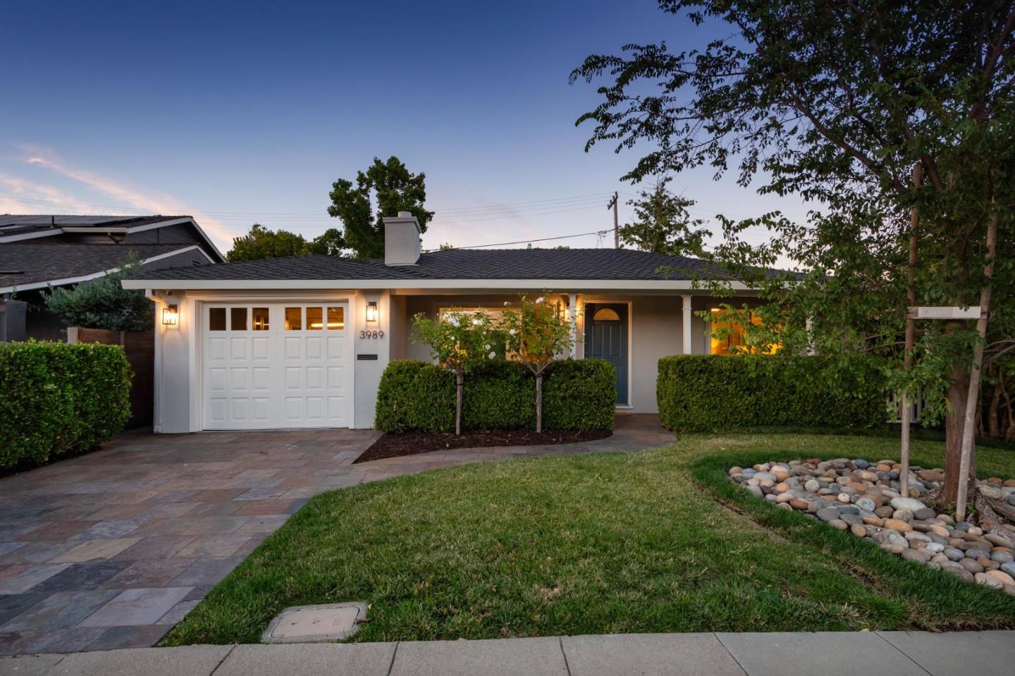 3989 Oneill Drive San Mateo, CA 94403 - Photo 30 of 47 a view of a house with a yard and garden