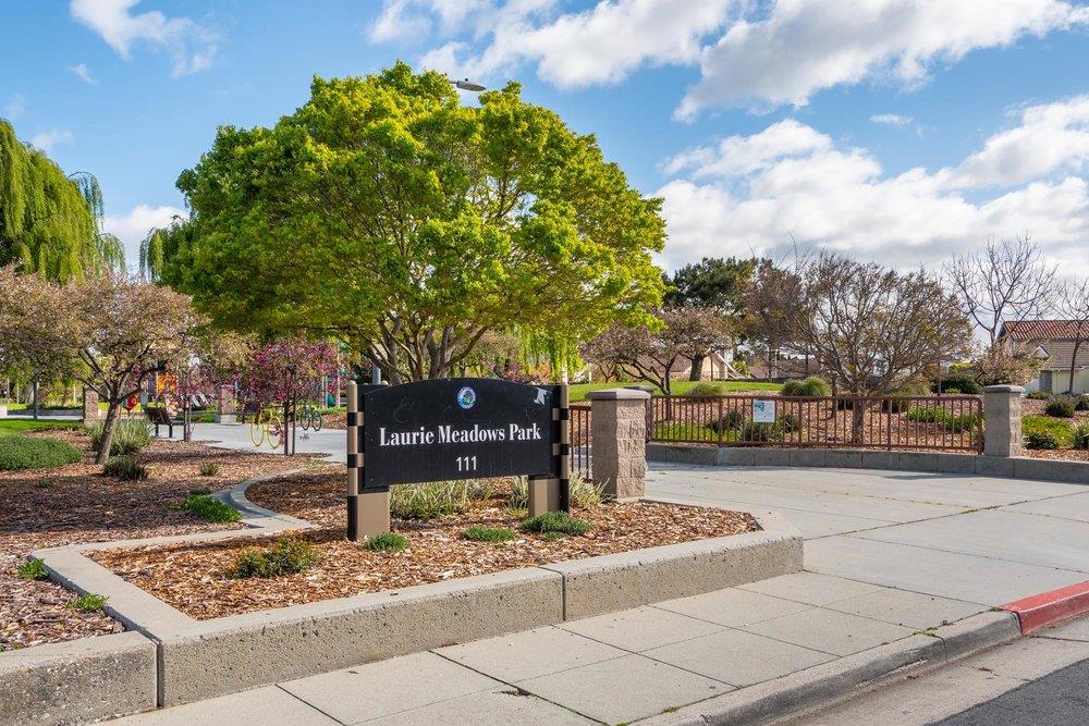 3989 Oneill Drive San Mateo, CA 94403 - Photo 42 of 47 a front view of a building with trees