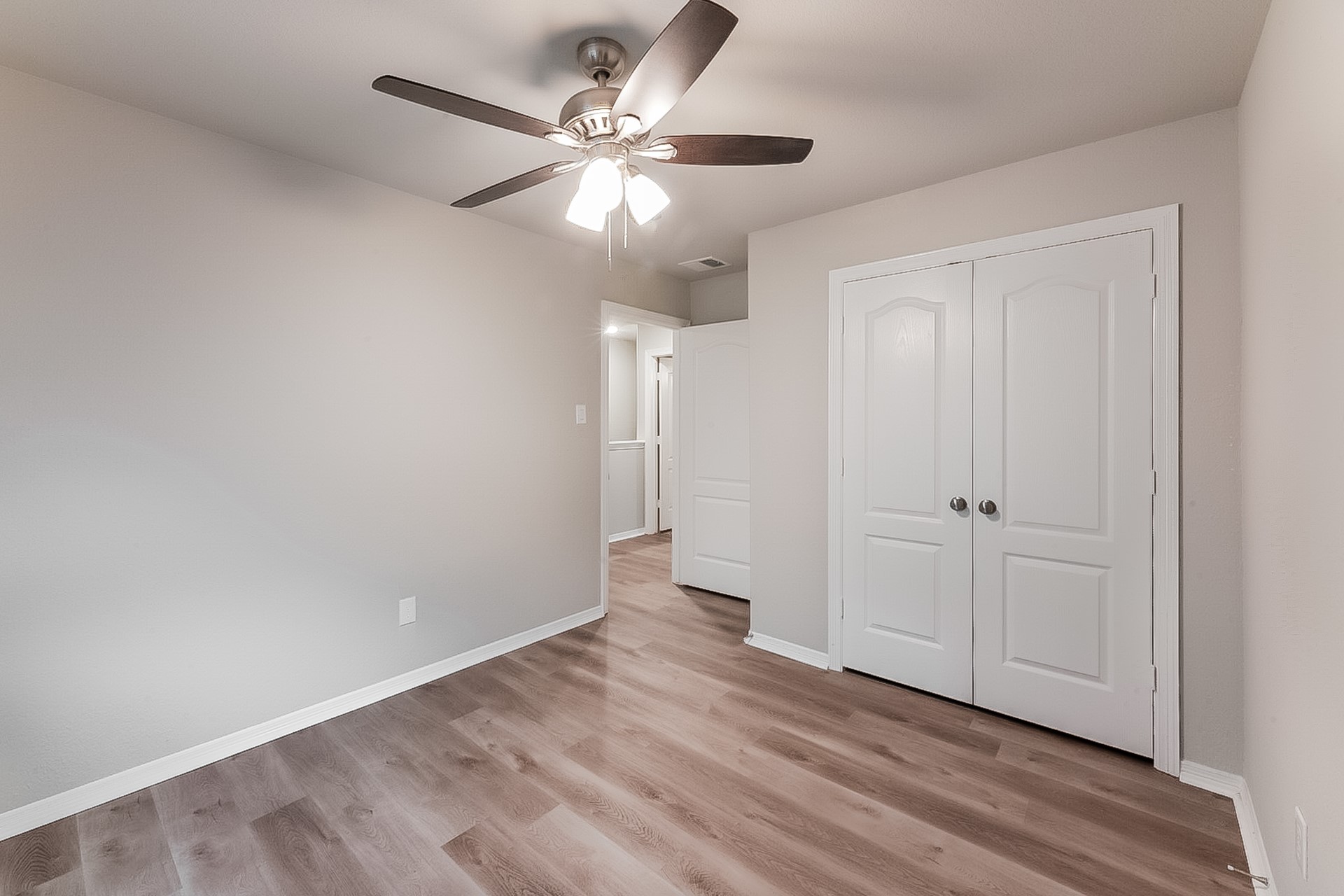 25542 Valverdant Court Porter, TX 77365 - Photo 14 of 17 wooden floor in an empty room