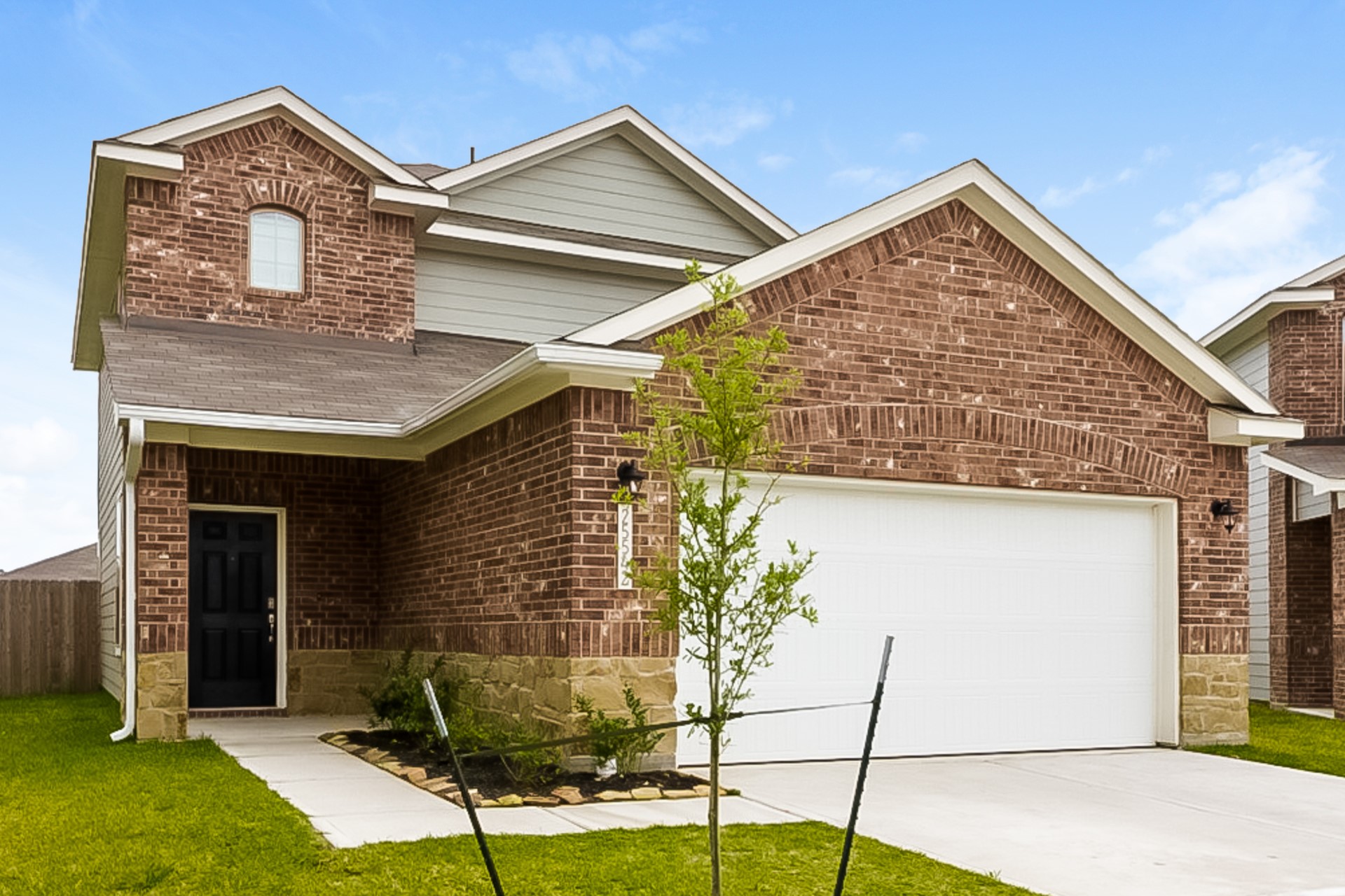 25542 Valverdant Court Porter, TX 77365 - Photo 2 of 17 a view of a house with a yard