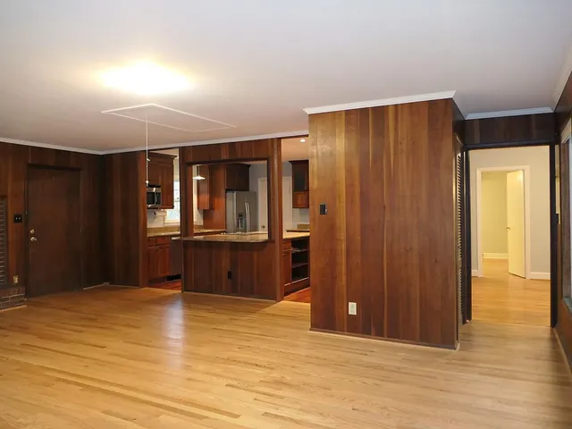 a view of a livingroom with wooden floor