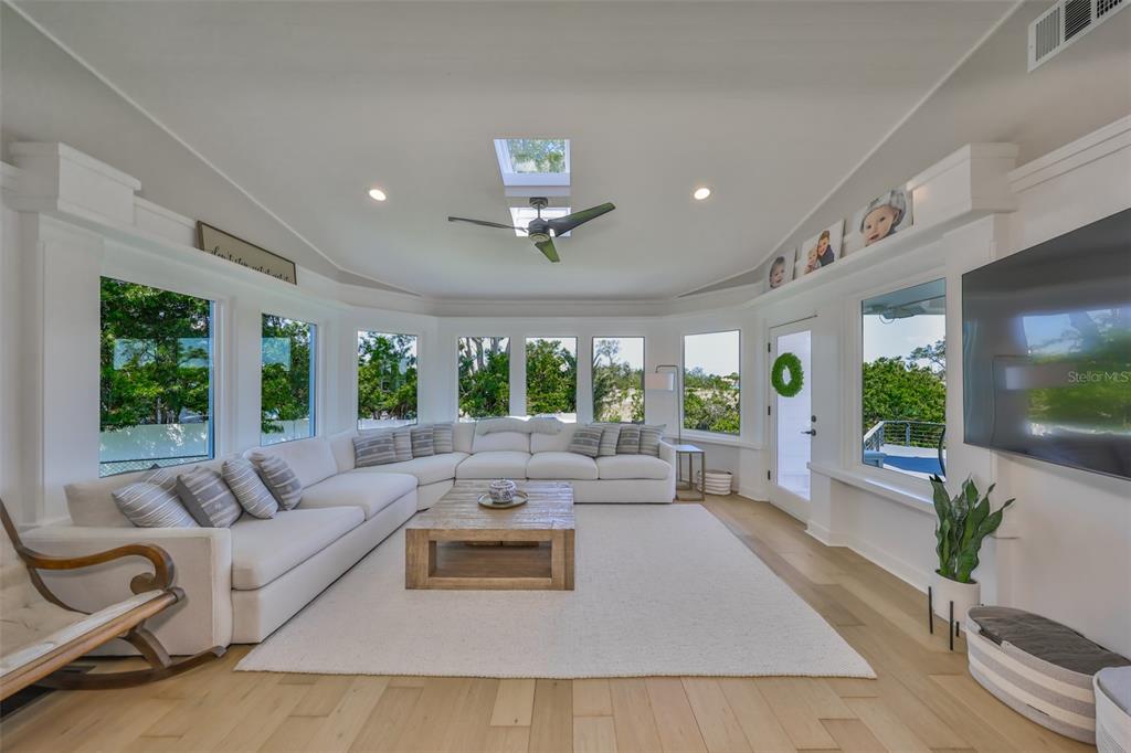 945 Bunker View Drive Apollo Beach, FL 33572 - Photo 20 of 92 a living room with furniture and a large window