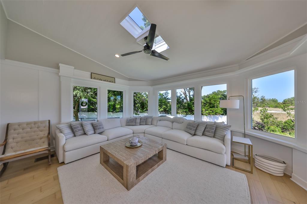 945 Bunker View Drive Apollo Beach, FL 33572 - Photo 22 of 92 a living room with furniture and a large window