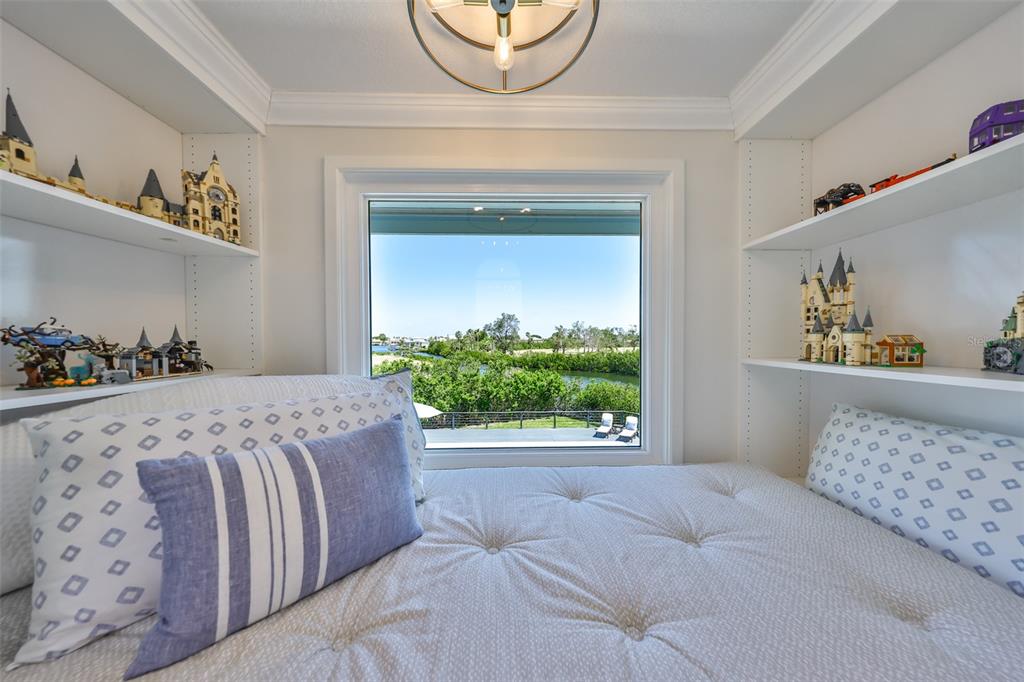 945 Bunker View Drive Apollo Beach, FL 33572 - Photo 41 of 92 a bedroom with a bed and a window