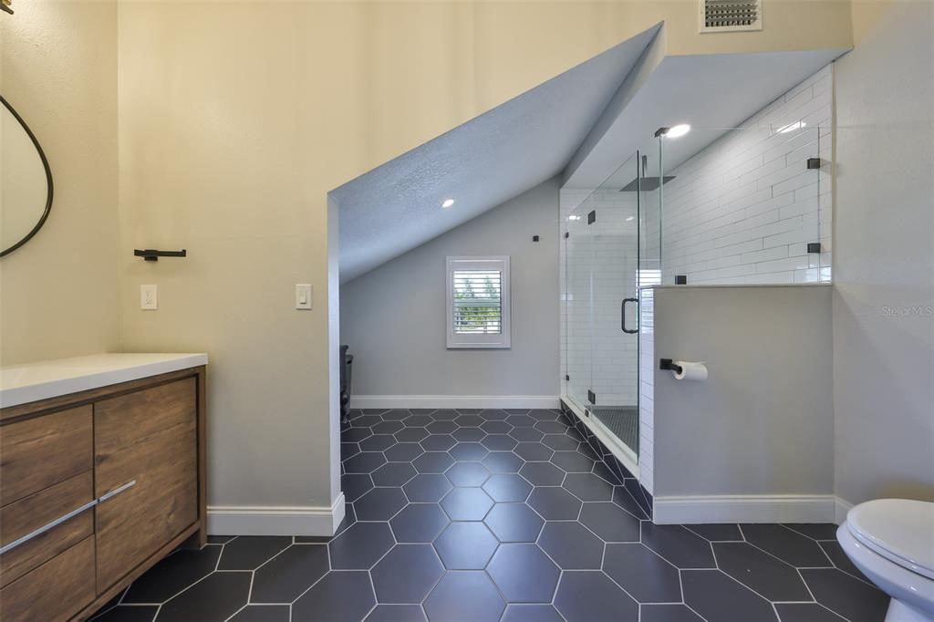 945 Bunker View Drive Apollo Beach, FL 33572 - Photo 55 of 92 a bathroom with a sink and a toilet