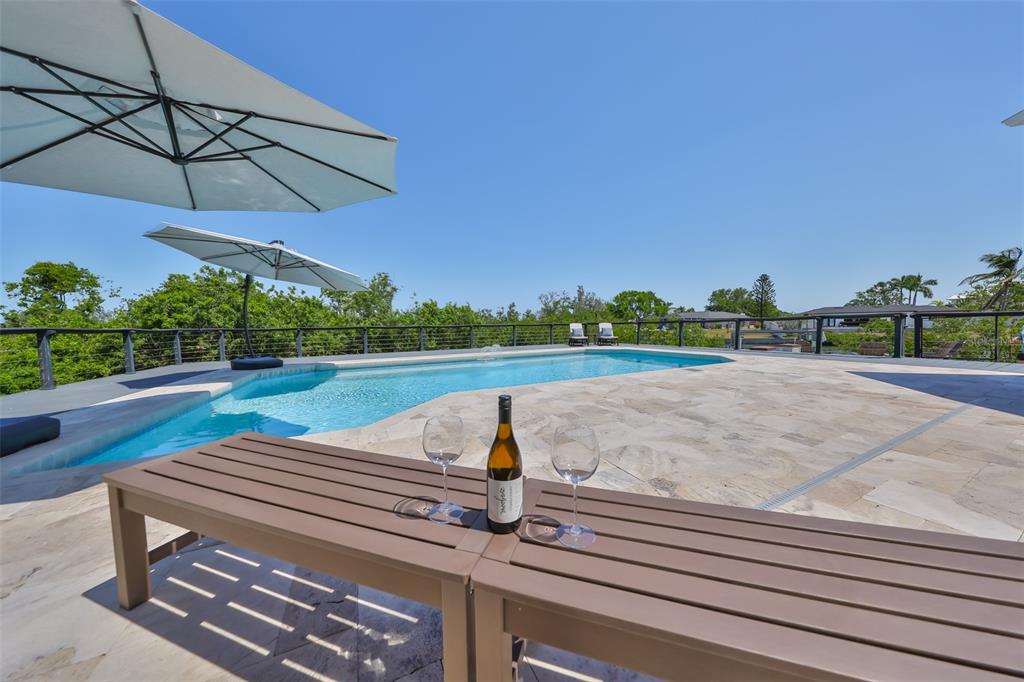 945 Bunker View Drive Apollo Beach, FL 33572 - Photo 72 of 92 a view of a backyard with a patio
