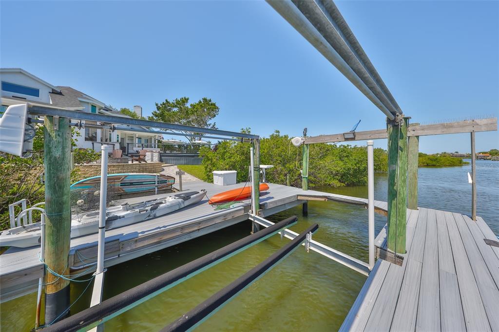 945 Bunker View Drive Apollo Beach, FL 33572 - Photo 82 of 92 a view of a balcony with floor to ceiling windows with wooden floor