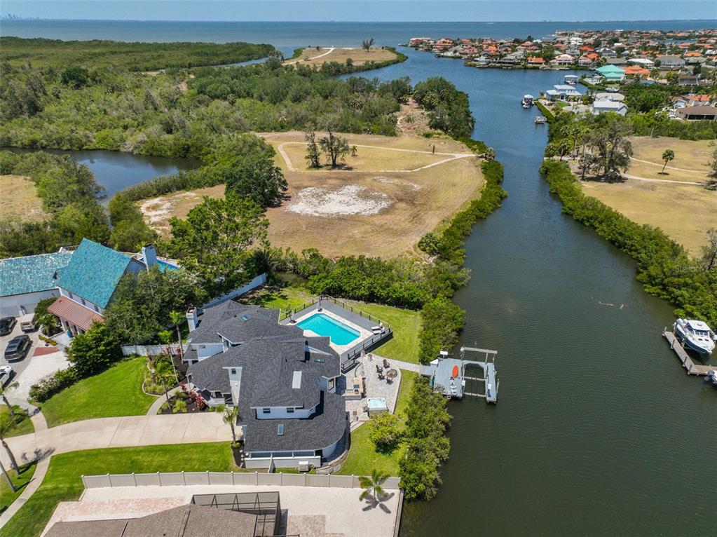 945 Bunker View Drive Apollo Beach, FL 33572 - Photo 87 of 92 an aerial view of residential houses with outdoor space and lake view