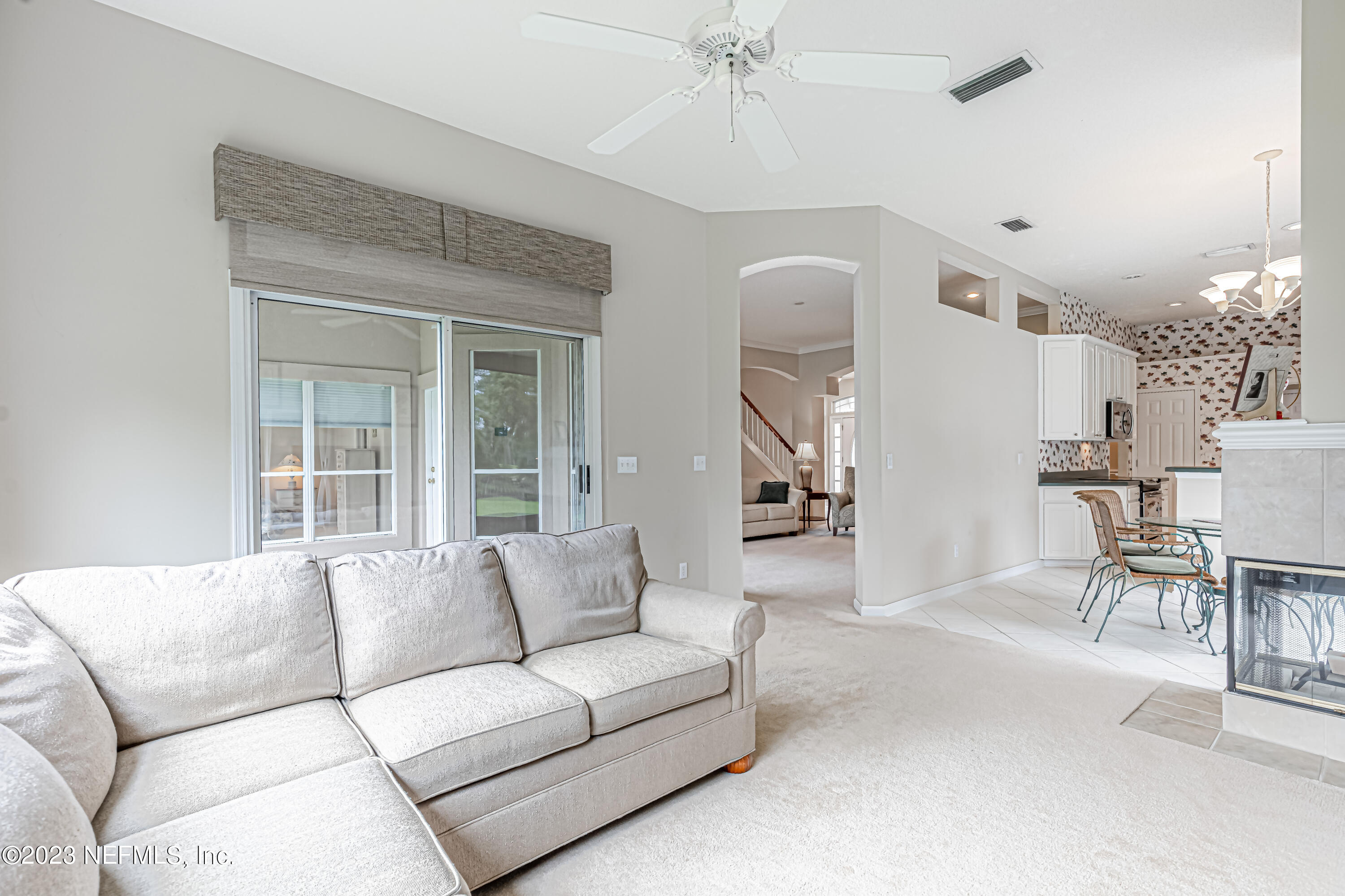 1614 Pinecrest Drive Fleming Island, FL 32003 - Photo 19 of 86 a living room with furniture and a large window