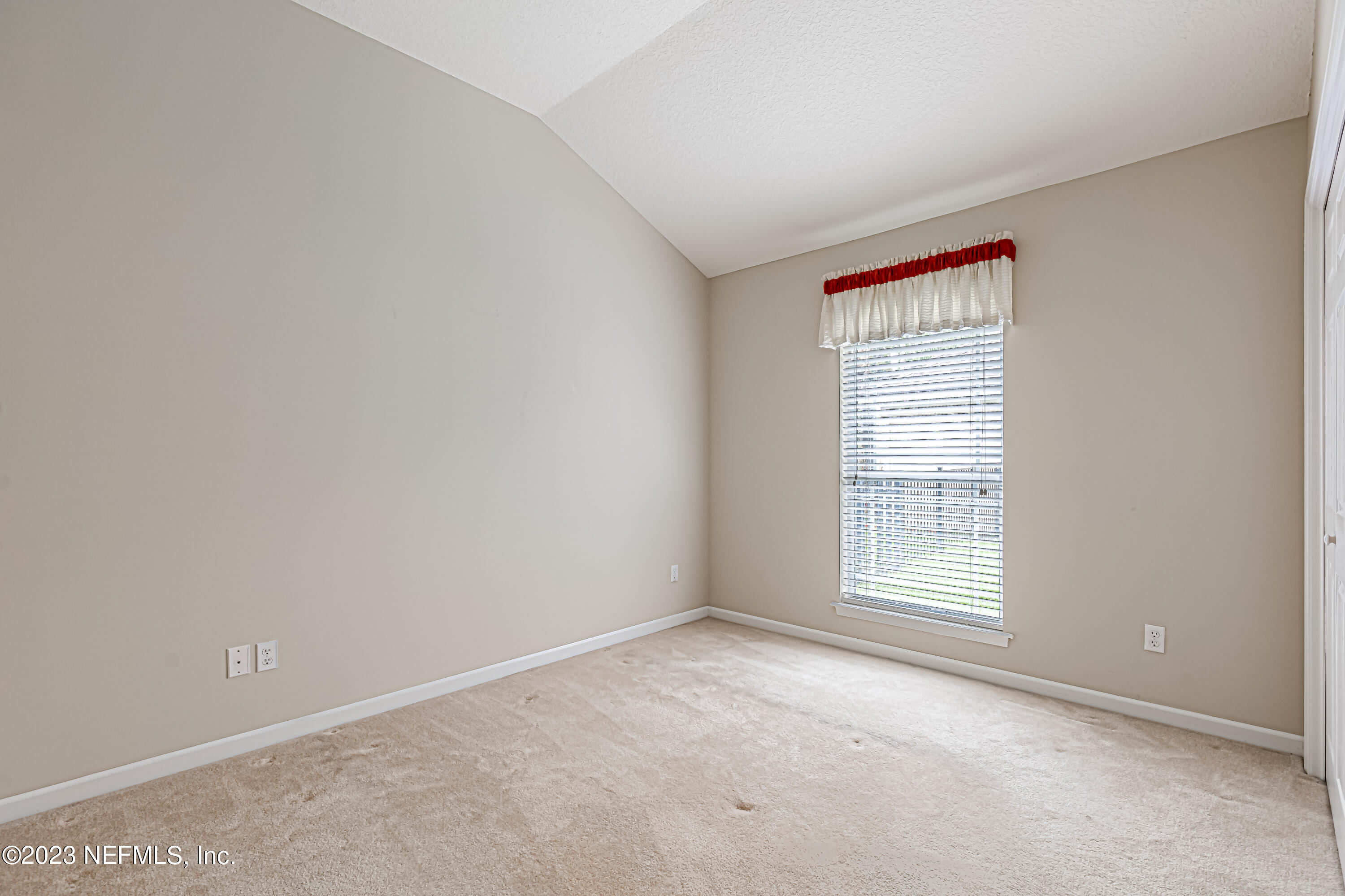 1614 Pinecrest Drive Fleming Island, FL 32003 - Photo 20 of 86 an empty room with windows