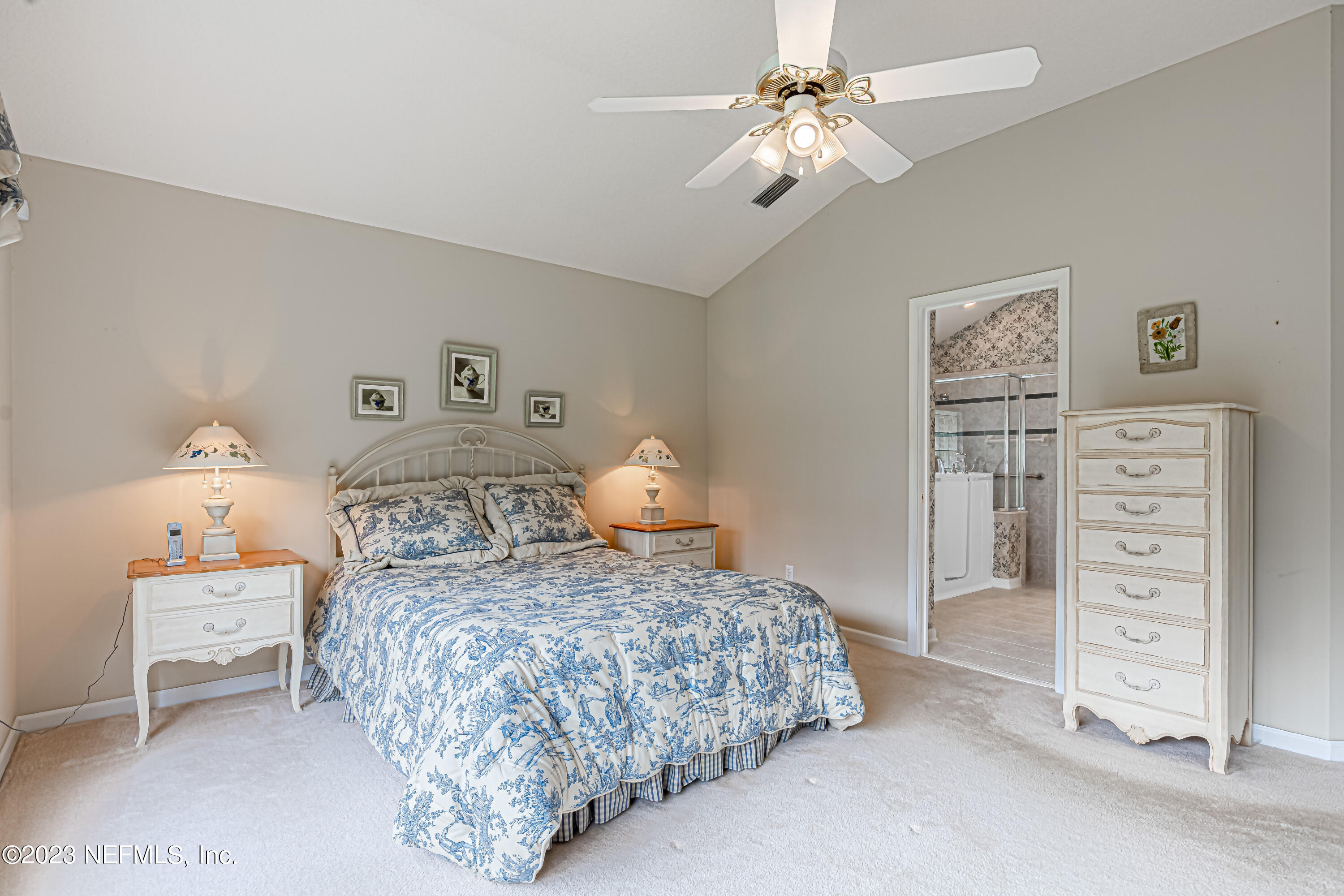1614 Pinecrest Drive Fleming Island, FL 32003 - Photo 24 of 86 a bedroom with a bed and a cabinets