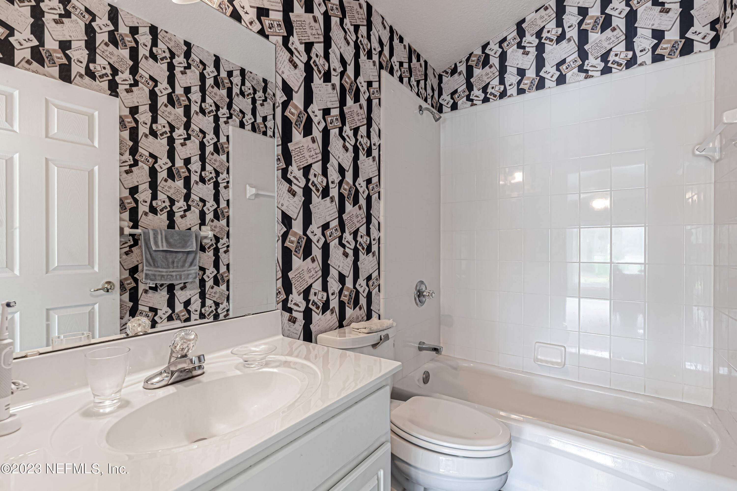 1614 Pinecrest Drive Fleming Island, FL 32003 - Photo 31 of 86 a bathroom with a sink toilet and shower